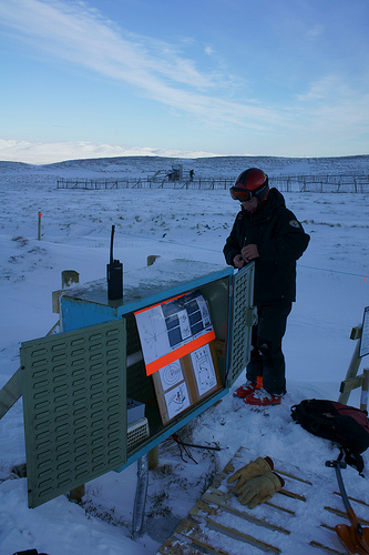 Ski patrol at the transceiver training park control panel
